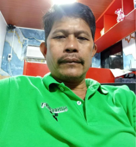 A person in a green shirt

AI-generated content may be incorrect.