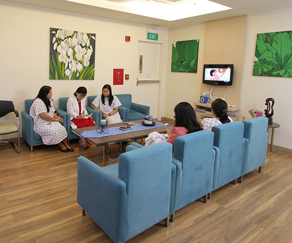 tmc doctors and patients at a lounge area