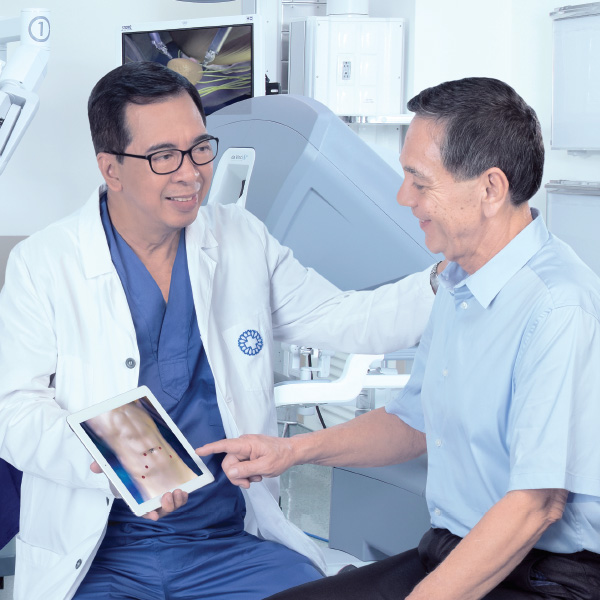 male doctor discussing test results with an elder male patient