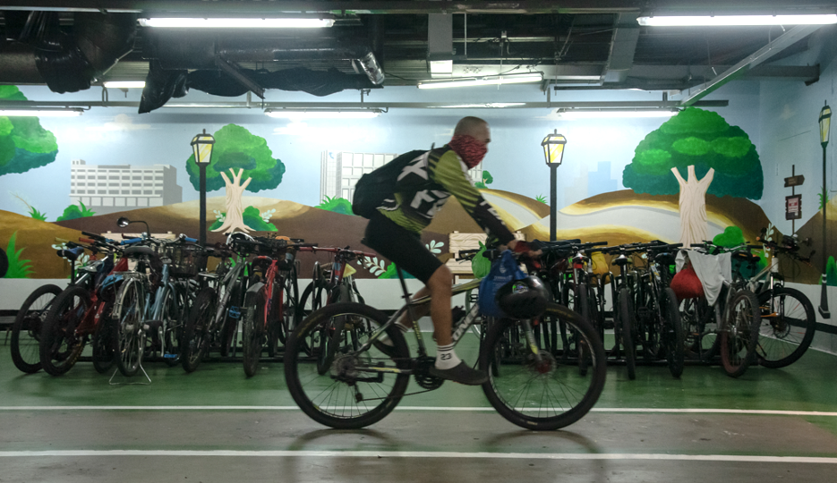 biker at a parking space for bikes