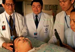 tmc doctors analyzing a patient head