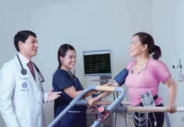 doctor and nurse with a patient undergoing a physical assessment