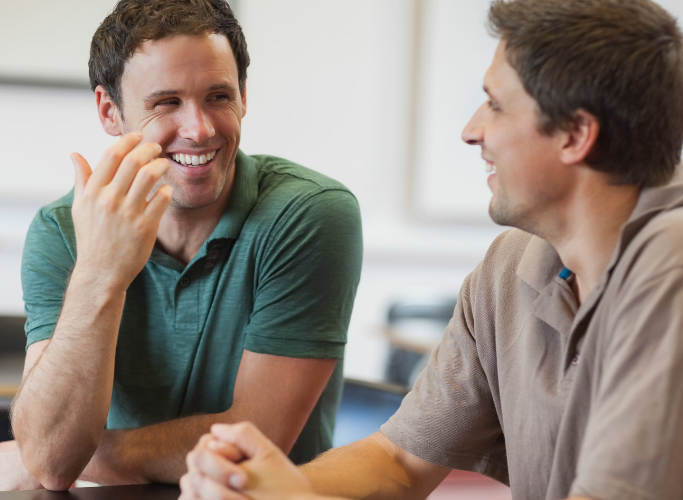 two male patients sharing stories