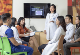 group of doctors and nurses talking